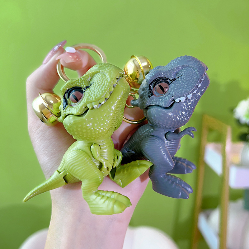 Net red Tyrannosaurus Rex bite hand toy keychain creative dinosaur small pendant couple schoolbag pendant small gift wholesale