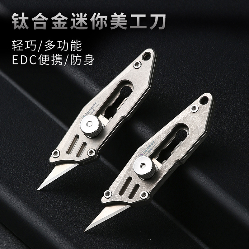 Direct selling mini titanium alloy art knife outdoor portable edc key chain portable pendant paper cutting express knife
