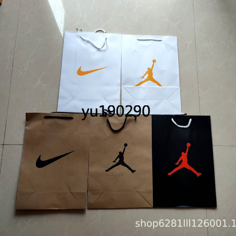 aj nk handbag packaging bag paper bag clothing shopping bag gift bag shoe box bag QC-foto från 1688 på Qualit.ly