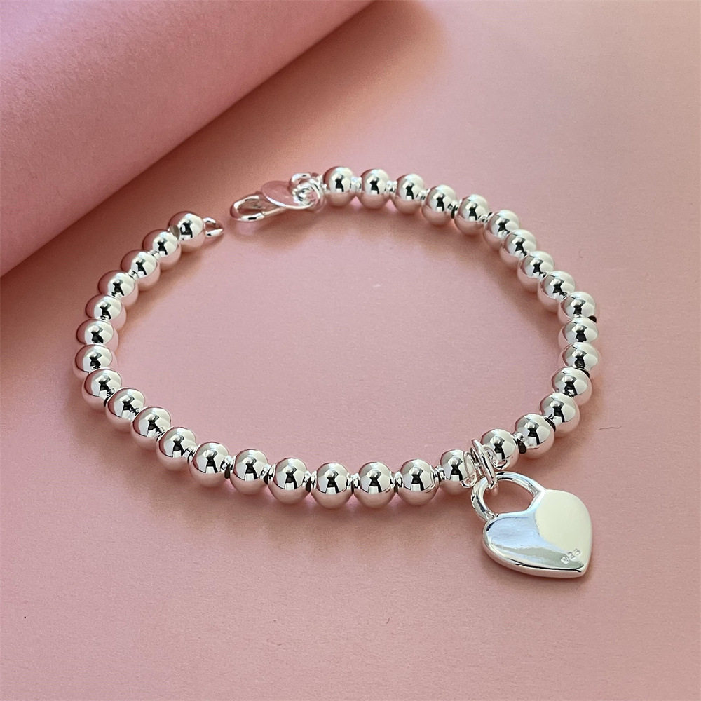 Foreign trade jewelry silver plated beads heart lock bracelet trembles popular bracelet in stock wholesale suitable for men and women