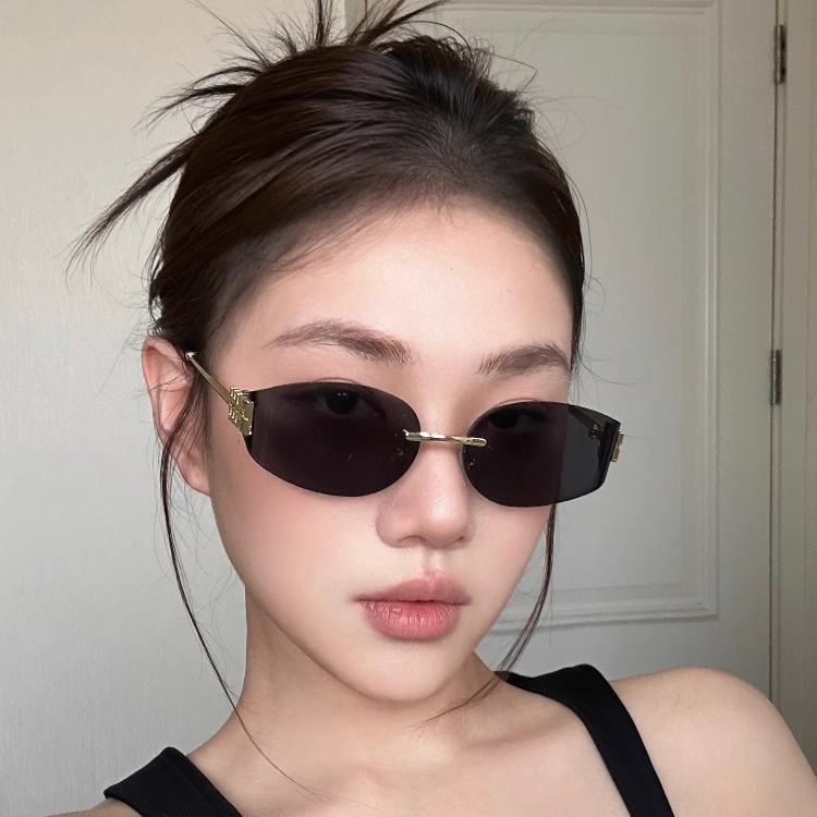 European and American Fashion Sweet and Cool Sexy Mu Home Sunglasses Curved Convex Shape Metal Frameless Cut Edge Sunglasses Uv Protection