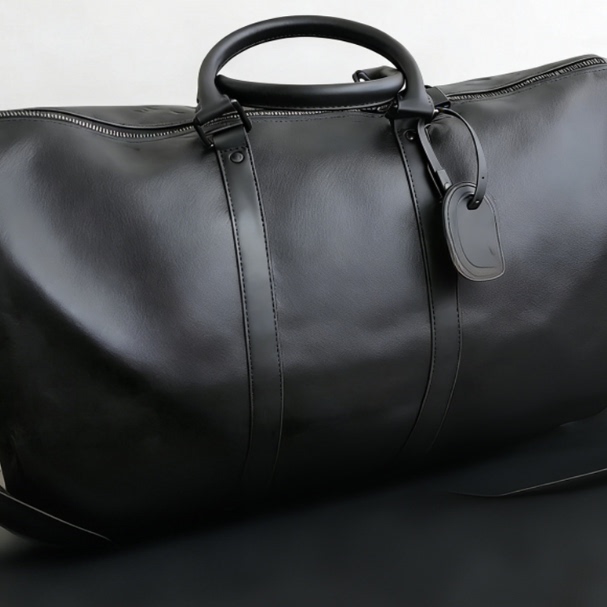 Louis Vuitton Monogram Embossed Keepall Bandouliere Black