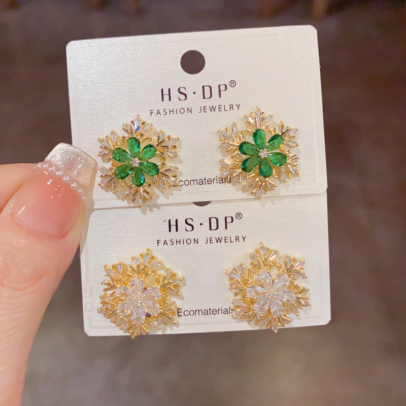 Autumn and Winter Exquisite and Fashionable Zircon Rotating Snowflake Earrings with Unique and Simple Design, Wholesale
