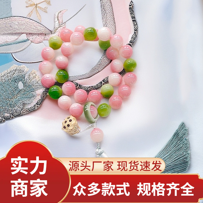 Explosions national style powder gradient clear lotus white jade bodhi bracelet female lotus tassel hand-held text play Buddha beads plate play wholesale