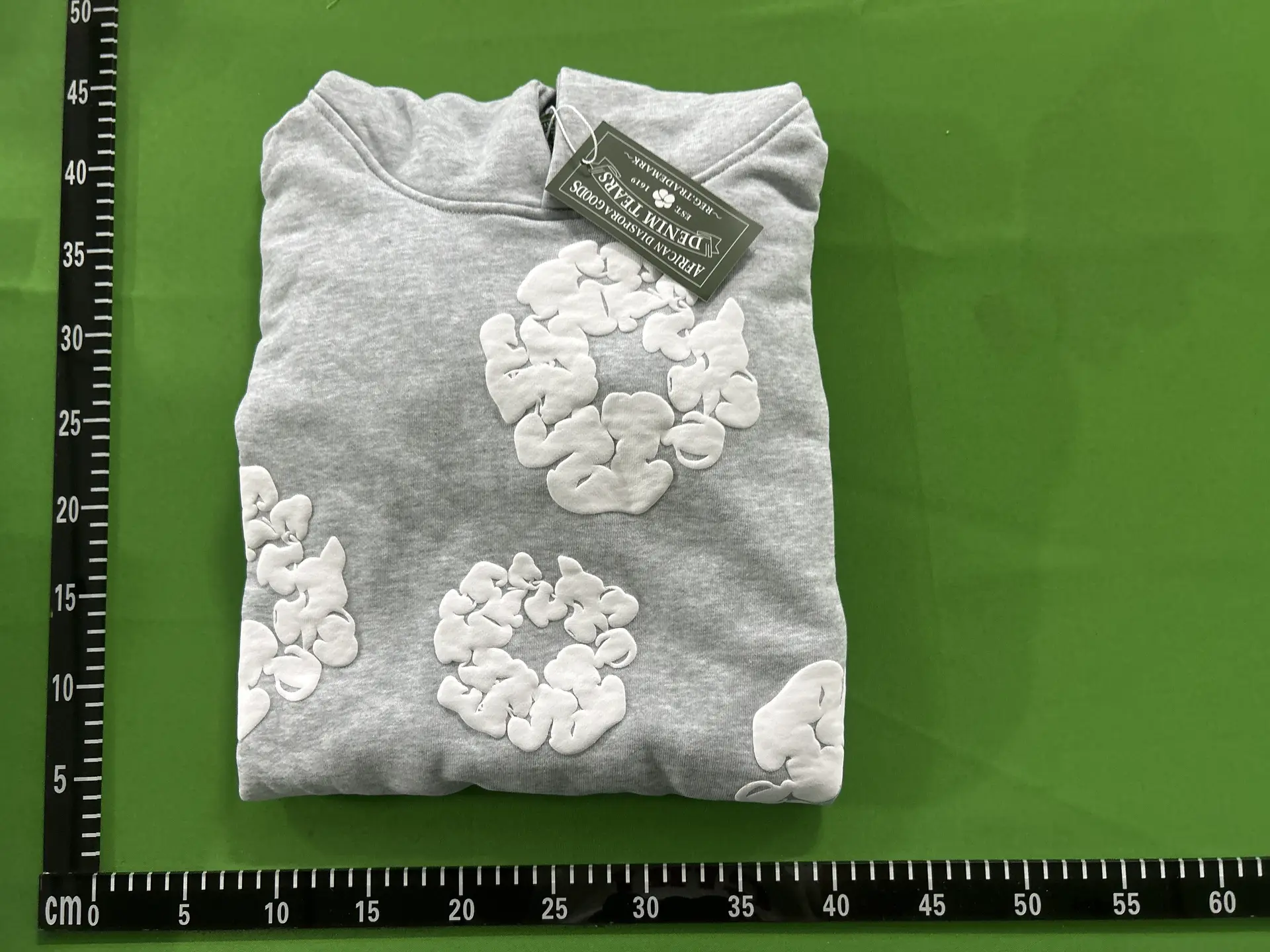 2023 autumn and winter new cross-border street fashion White Flower foam casual loose hooded sweater for men and women