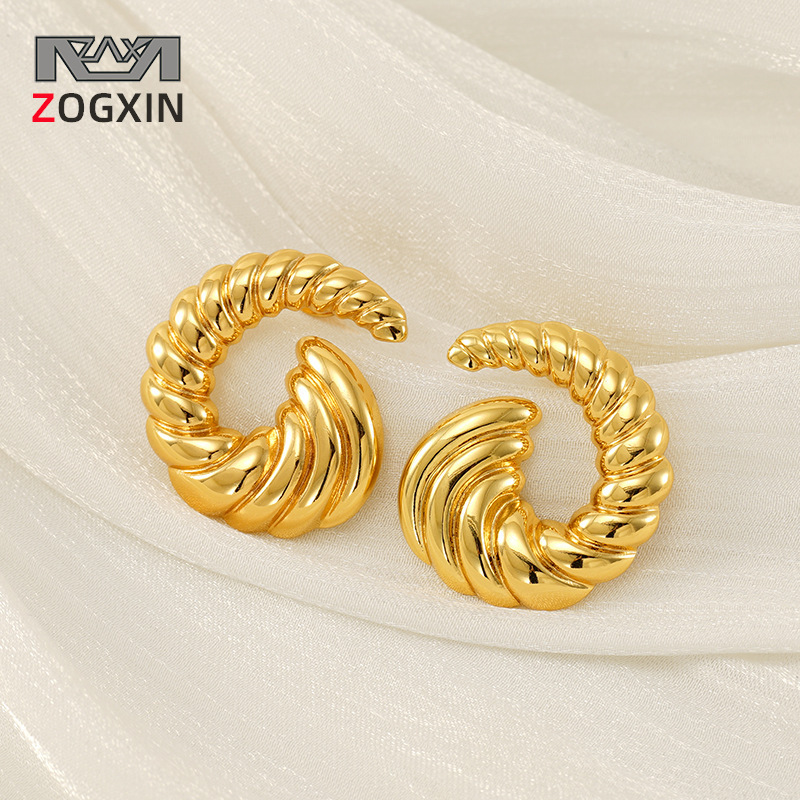 Cross-border Europe and the United States INS style simple personality trend design sense 18k gold non-fading spiral titanium steel earrings for women
