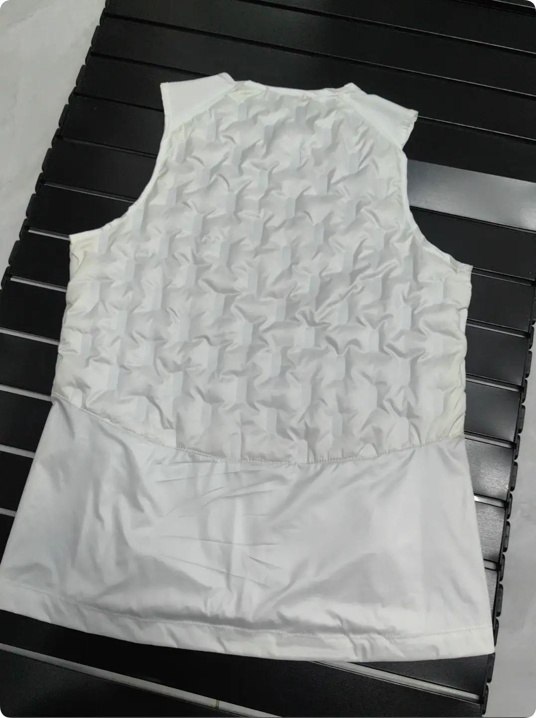 White quilted vest