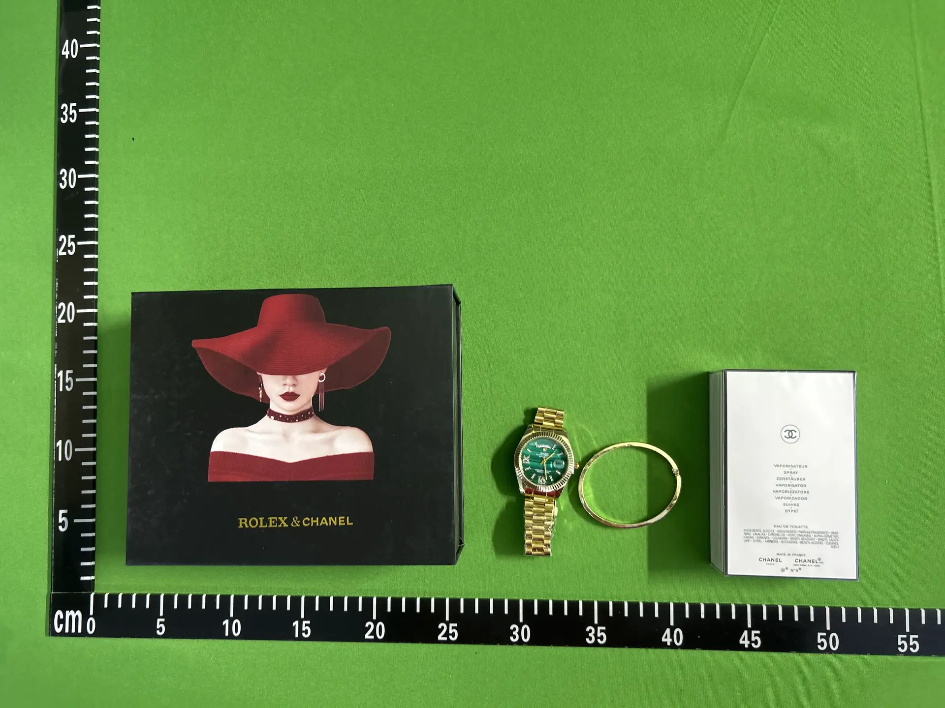 Rolex watch and Chanel perfume