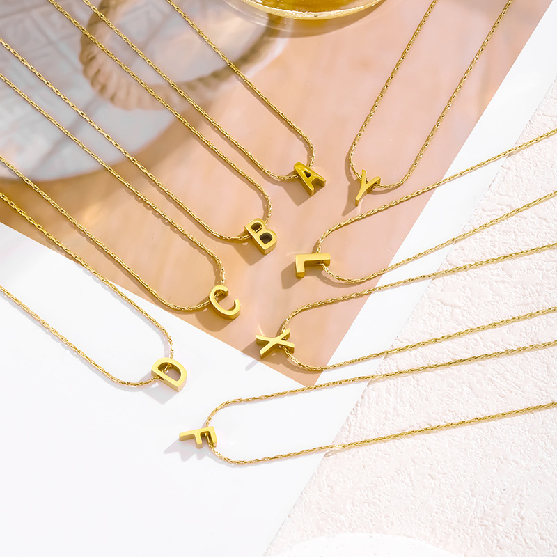 Cross-border Hot Sale INS Gold 26 Capital English Alphabet Necklace Perforated Pendant Fine Polished Stainless Steel Necklace