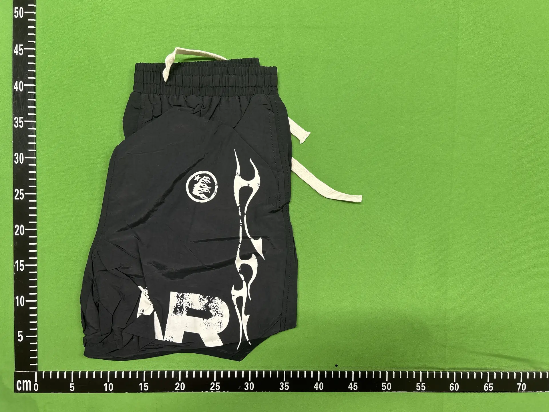 Black shorts with white graphic print