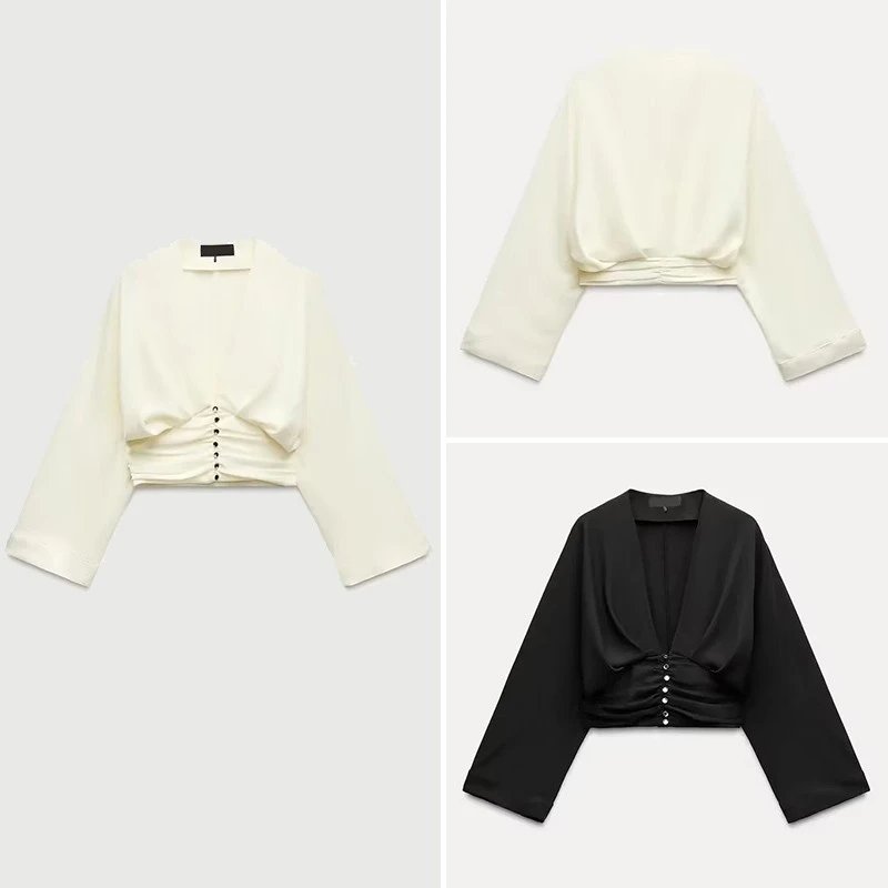 Pleated V-neck button-detail waist-cinching top