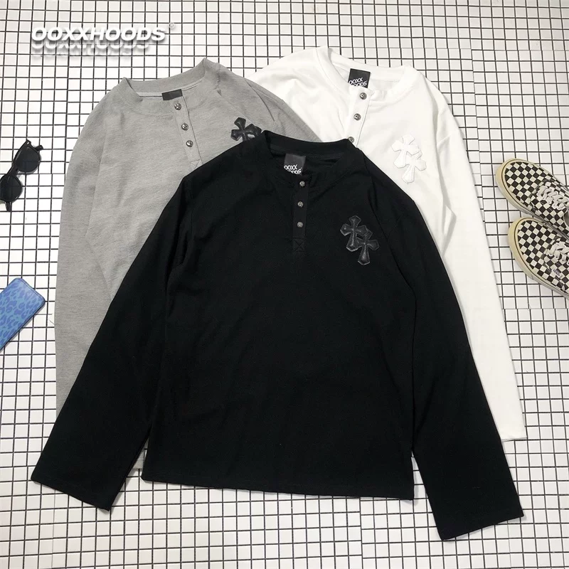 Long sleeved T-shirt from Europe and America, simple yet not picky, with a leather cross, trendy metal button, V-neck, autumn and winter fashion base shirt