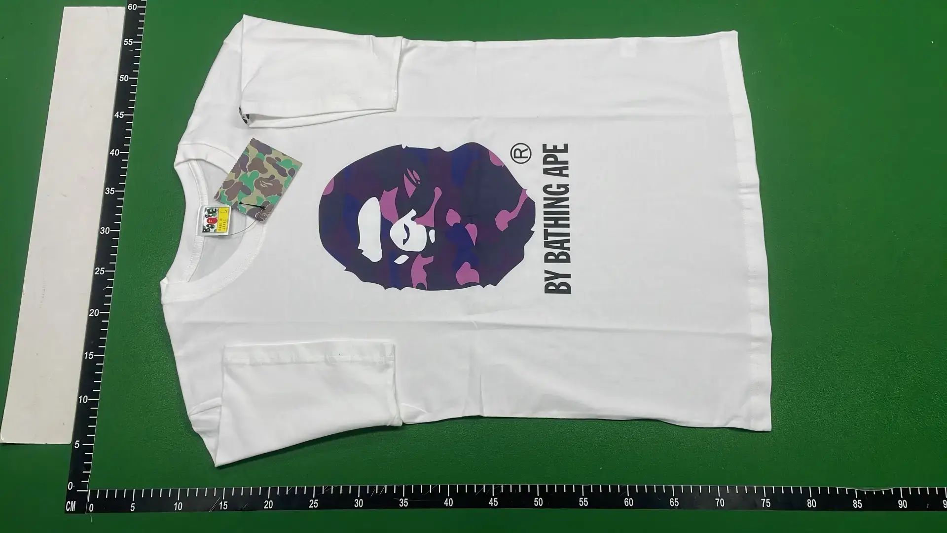 BY BATHING APE White T-Shirt with Purple Camo Ape Head