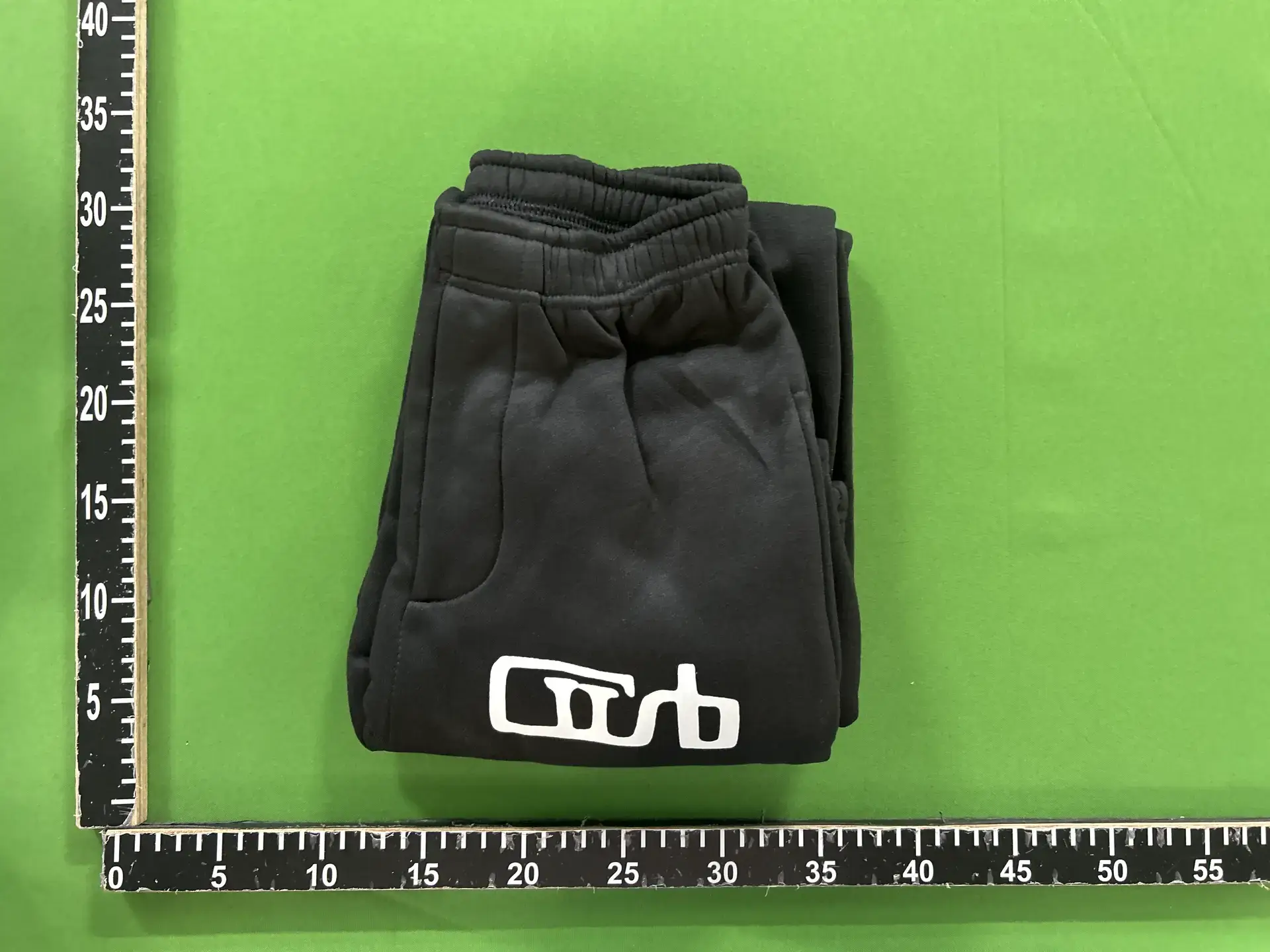Black Sweatpants with White Logo