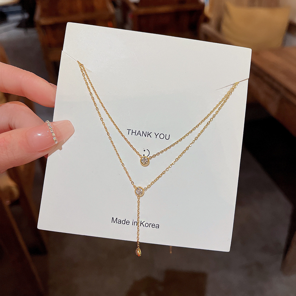 Titanium steel 18K real gold plating double tassel necklace women do not fade niche design clavicle chain high sense wholesale