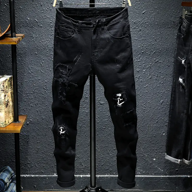 Black new broken holes patch jeans male Slim elastic small feet youth skull print fashion beggar pants