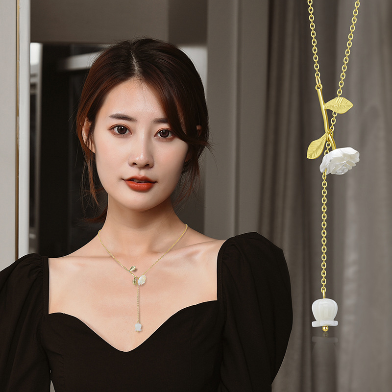 Factory Direct titanium steel rose necklace female super fairy French light luxury elegant white rose tassel clavicle chain wholesale