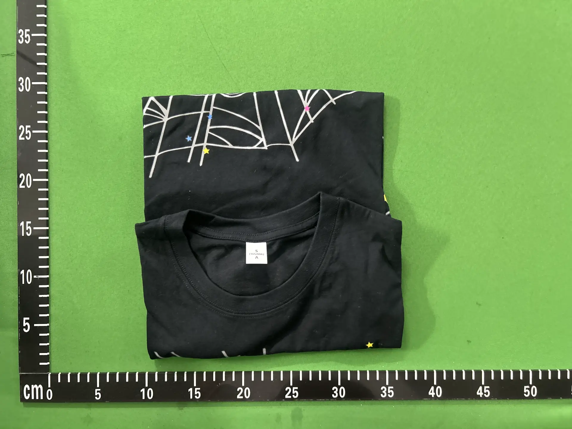 Black T-shirt with graphic print