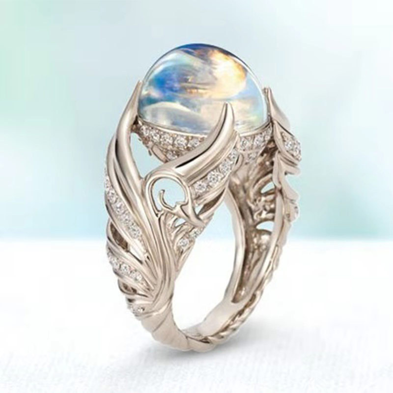 Wish New Hollow White Swan Colorful Imitation Moonstone Ring Women's European and American Cross-border E-commerce Hot Sale