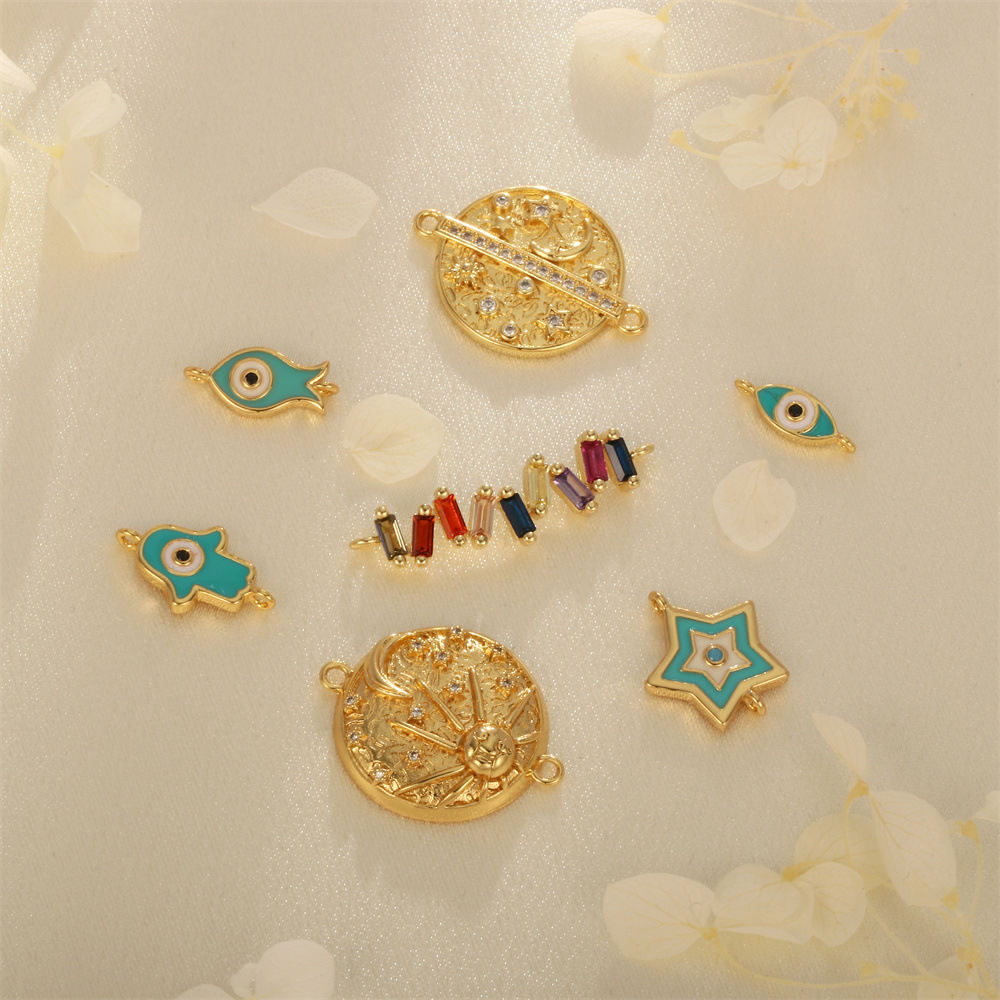 Europe and the United States best selling copper plated color zircon oil drop devil's eye palm fish five-pointed star sun moon pendant accessories