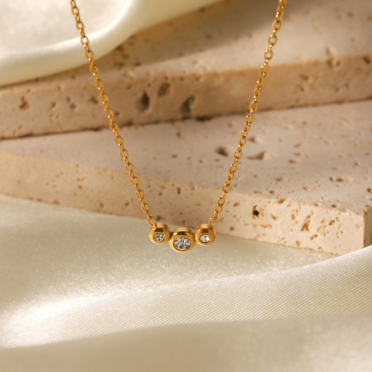 European and American 18K gold geometric stainless steel inlaid zircon pendant necklace female niche design titanium steel clavicle chain cross border