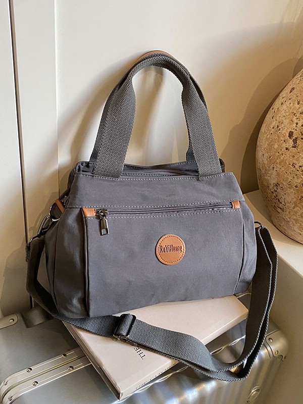 High-level cross-border multi-pocket textured nylon cloth bag 2025 new wide shoulder strap embossed letter single shoulder bag bag