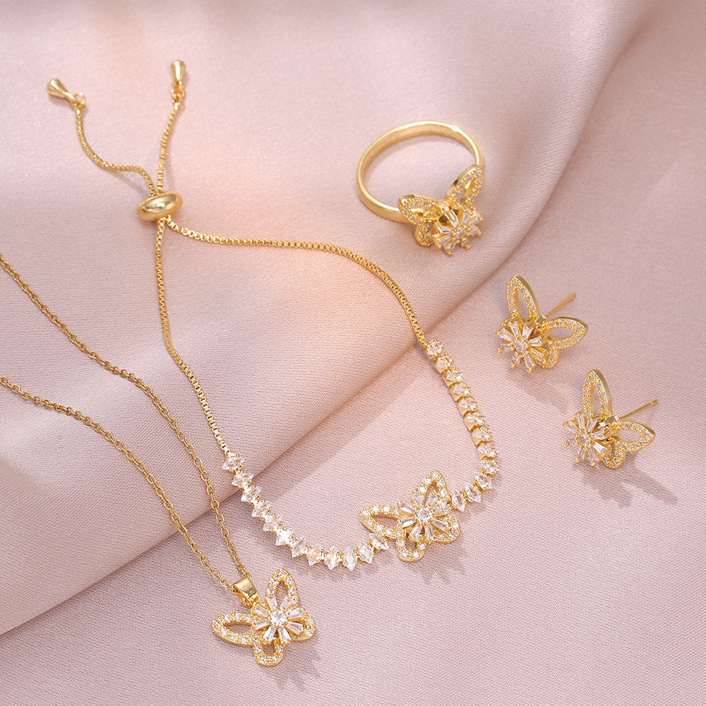 Necklace Women's Internet Celebrity Ins Trendy Cross-border Butterfly Three-piece Set Rotating Earrings Ring Necklace Micro-inlaid Zircon Clavicle Chain