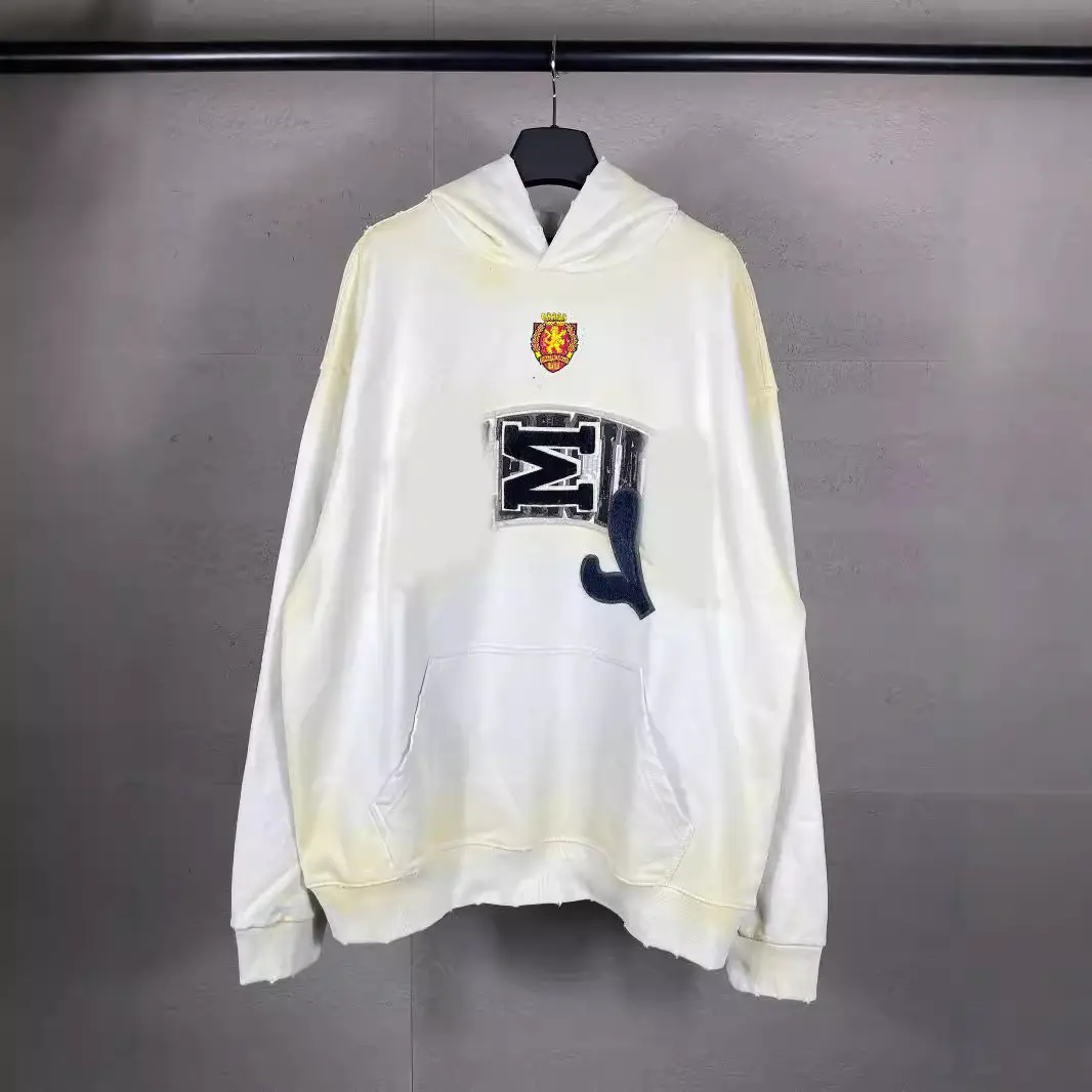 Autumn and winter Paris Manchester United co-branded badge logo washed and worn holes hand-painted craft hooded terry sweater