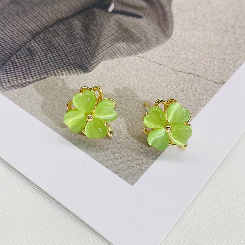 Rotating four love earrings women's new four-leaf flower green cat's eye stone earrings net popular explosions small fresh earrings