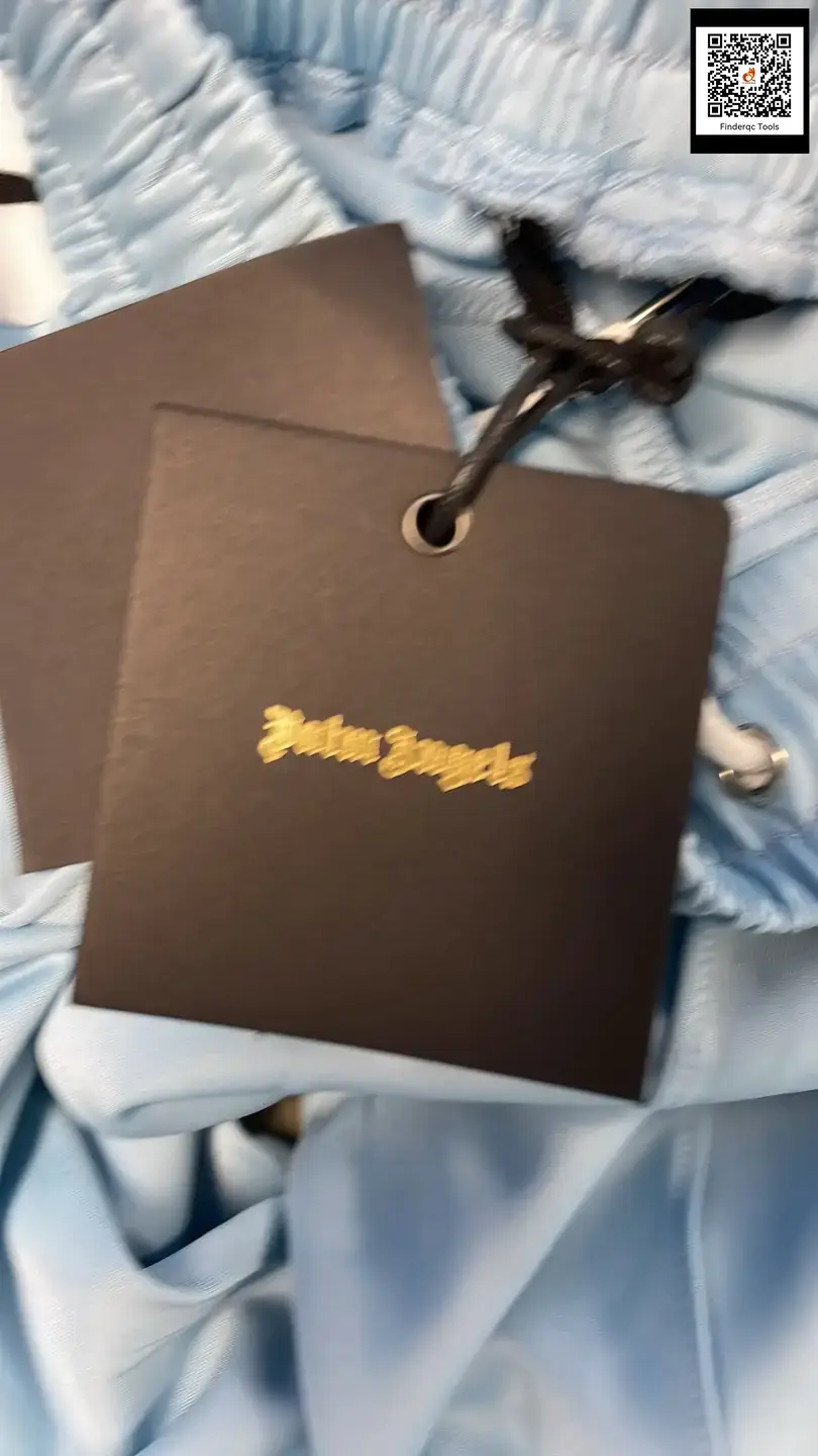 Palm Angels light blue track pants