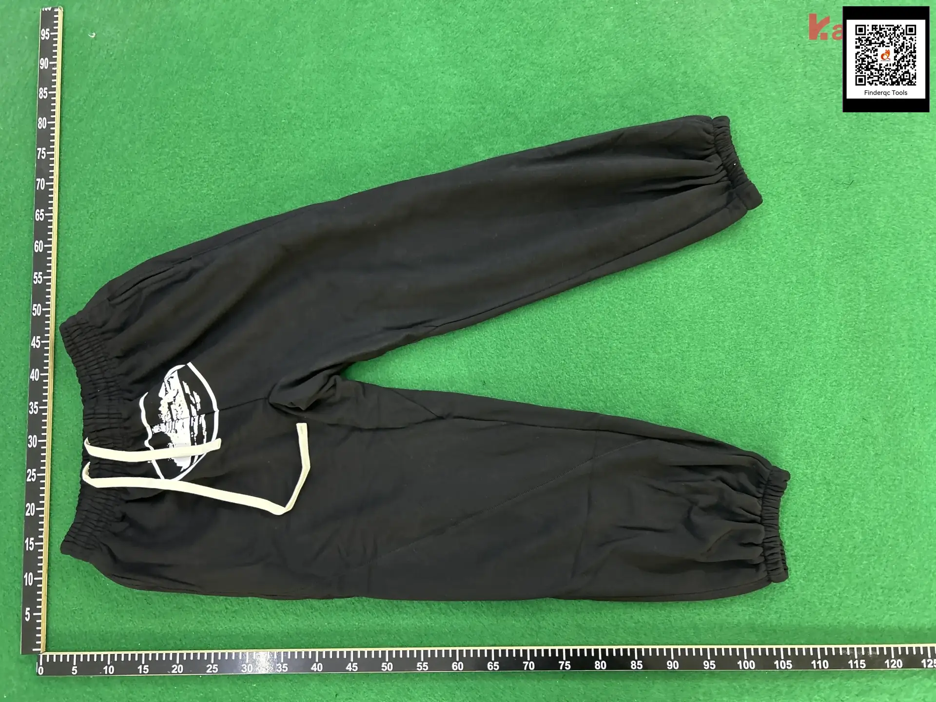 Black sweatpants with graphic print