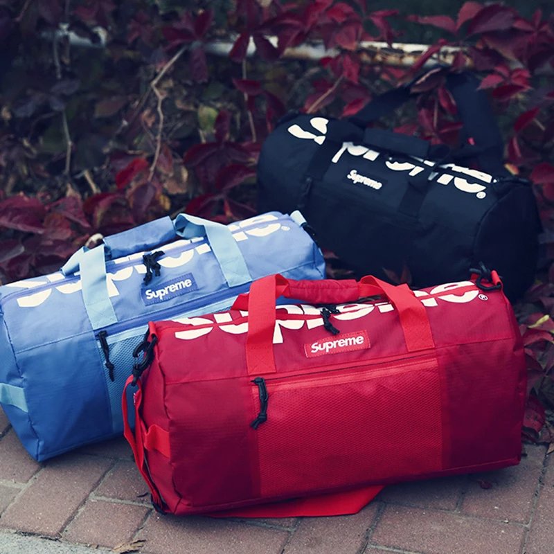 supreme counter with the same genuine men and women students schoolbag computer travel bag personality Korean version of the trend of fashion in Europe and the United States shoulder bag crossbody bag high middle school students schoolbag outdoor large capacity training fitness bag hot male soccer shoulder bag men's basketball sports training stand-alone cylinder capacity volleyball bag handheld crossbody bag luggage bag