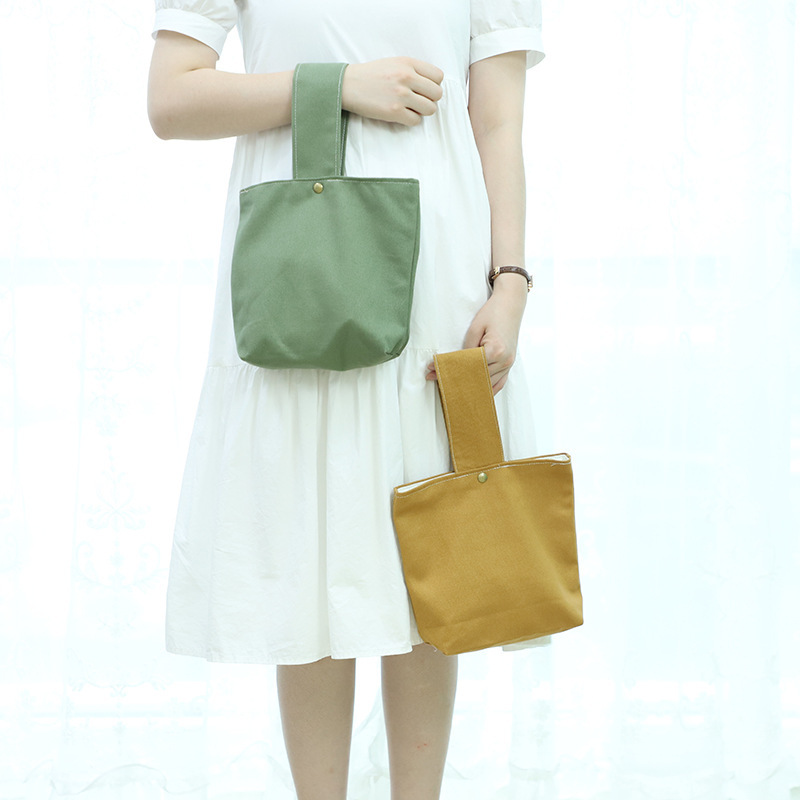 ins Simple New Solid Color Canvas Handbag Women's Artistic Mobile Phone Change Cloth Bag Walking Wrist Bag