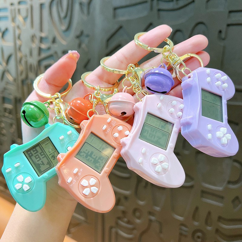 Hot selling handheld gopher machine mini hamster children's handheld hand speed response training game pendant keychain