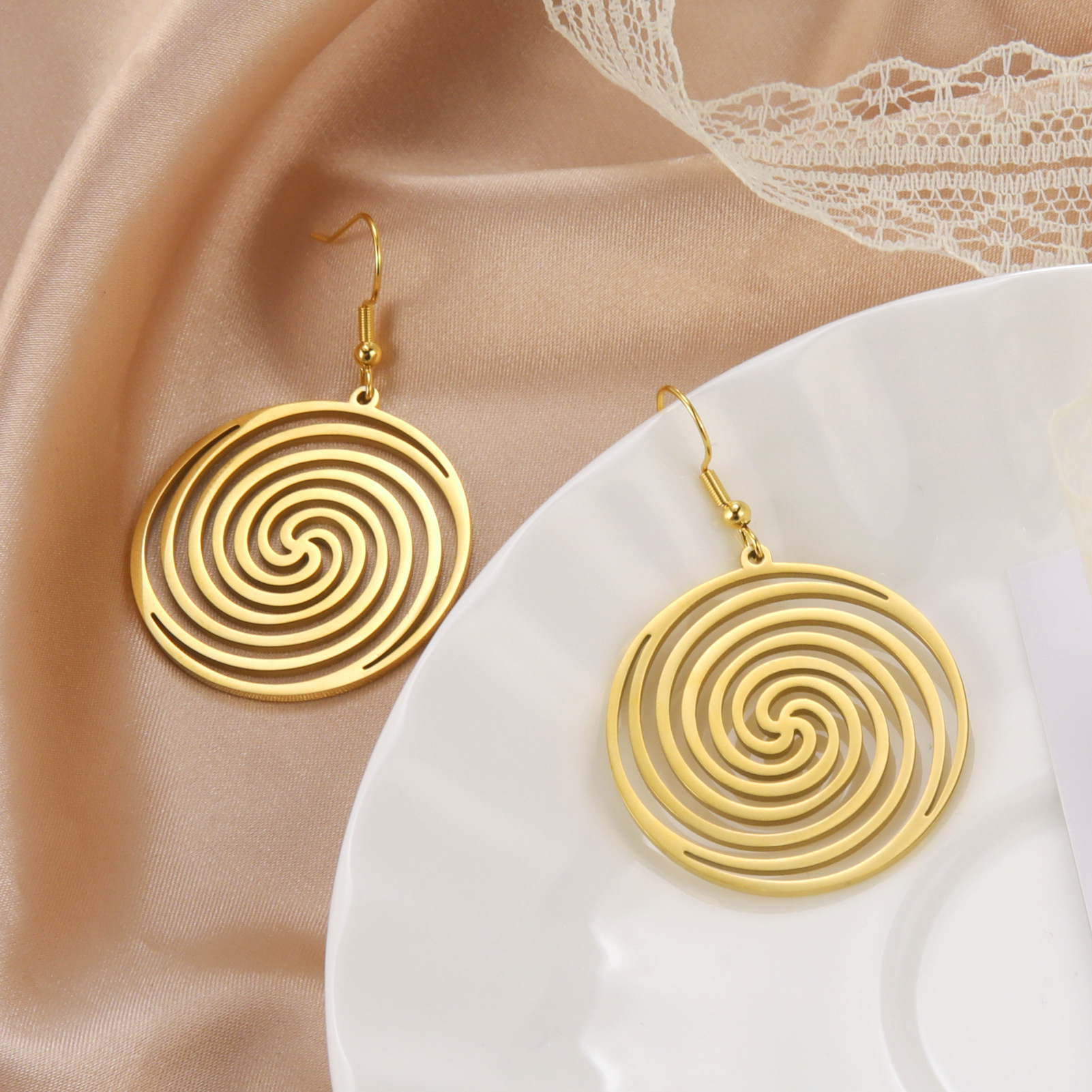 Spiral optical earrings titanium steel female hollow vortex round pendant earrings factory direct sales stainless steel Women's earrings
