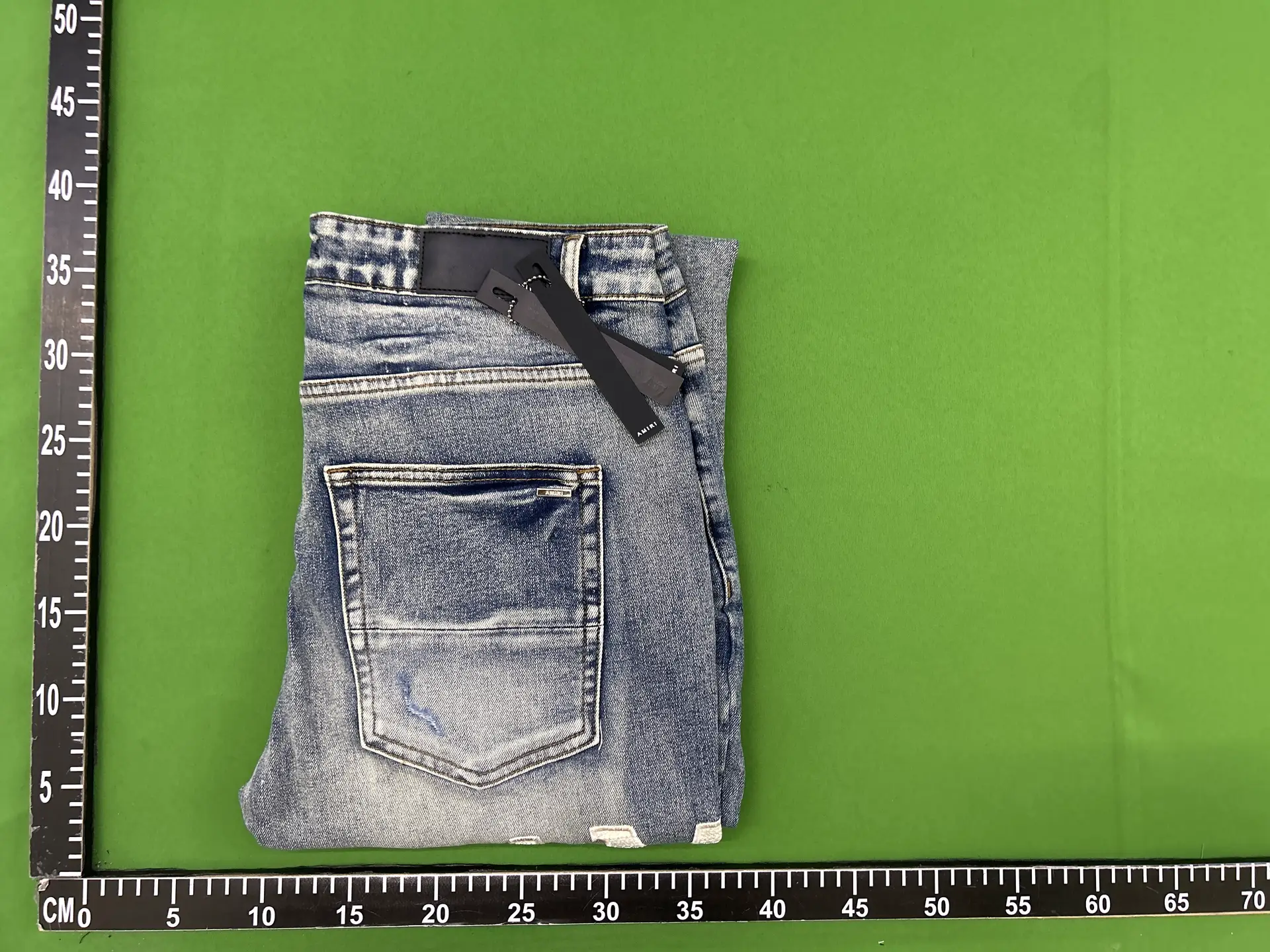 AMIRI distressed blue denim jeans