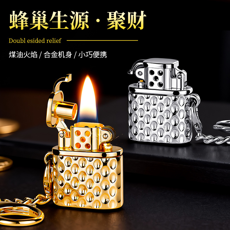New Honeycomb Three-Dimensional Embossed Portable Mini Fingertip Toy Keychain-Style Flint Wheel Kerosene Lighter