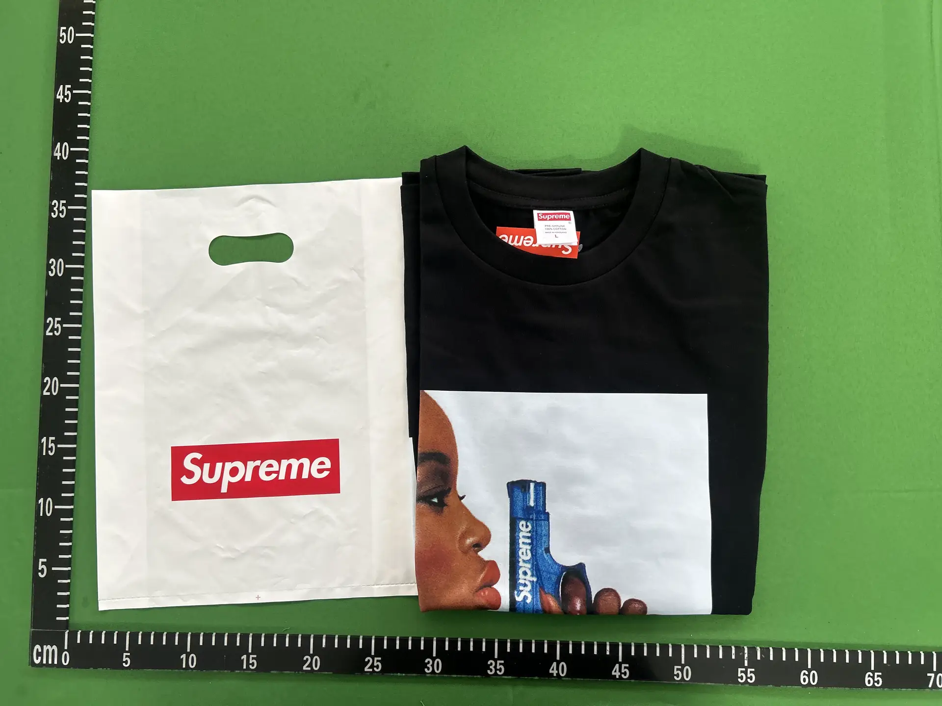 Supreme Black T-Shirt with Gun Graphic