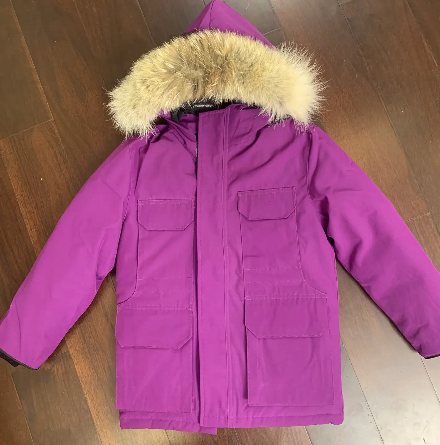 Warm and cozy white duck down coyote fur collar waterproof down jacket for autumn and winter couples
