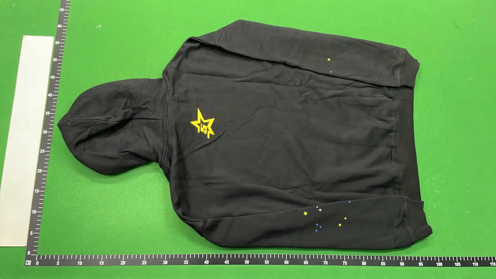 Black hoodie with star graphic