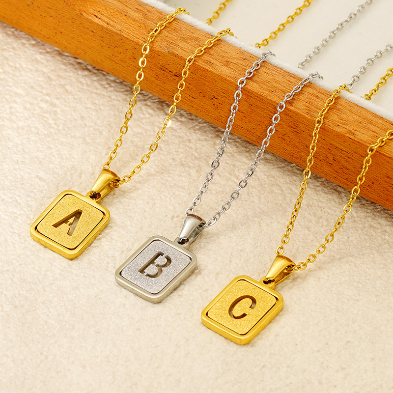 in stock stainless steel necklace cross-border Amazon wholesale personalized sand pressure new 26 letters pendant furnace plating