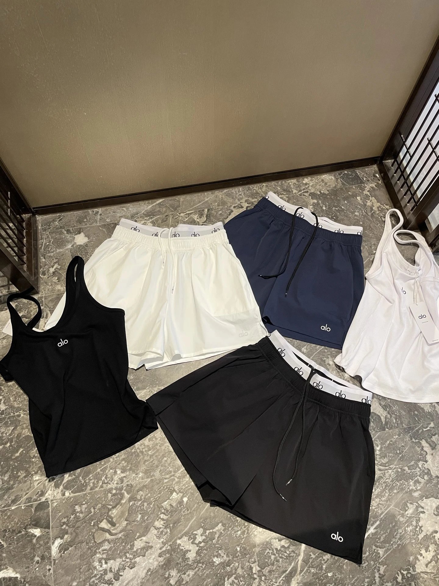 alo yoga shorts and tank tops