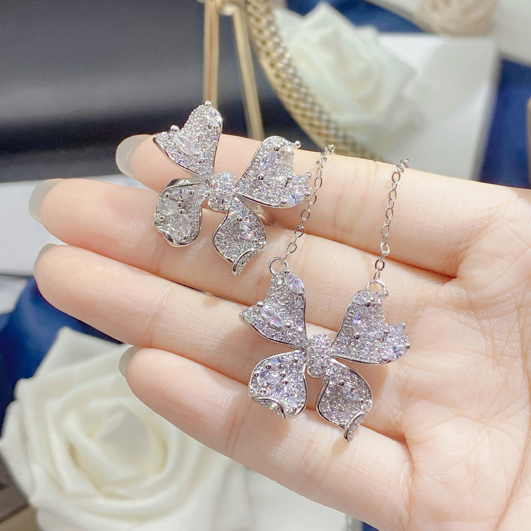 Cross-border light luxury niche sweet girl cute bow necklace clavicle chain Super fairy butterfly ring set Wholesale