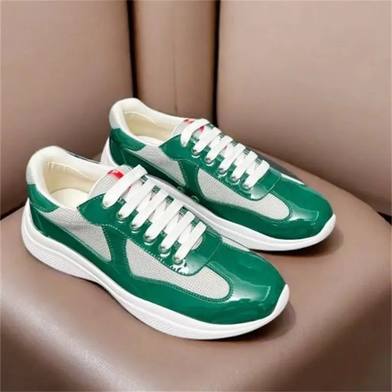 P*da patent leather sneakers