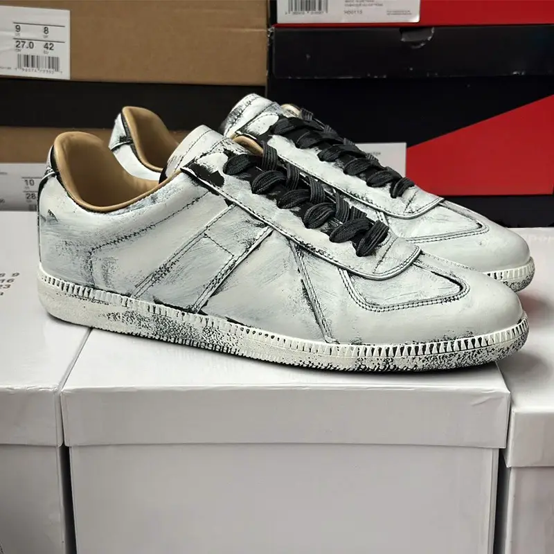Maison Margiela Replica Sneakers White Black Distressed