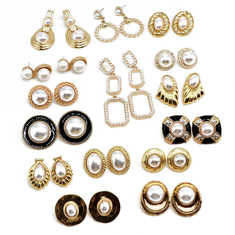 Factory supply imitation classical Pearl middle ancient ear clip Hepburn style silver pin earrings enamel glazed earrings