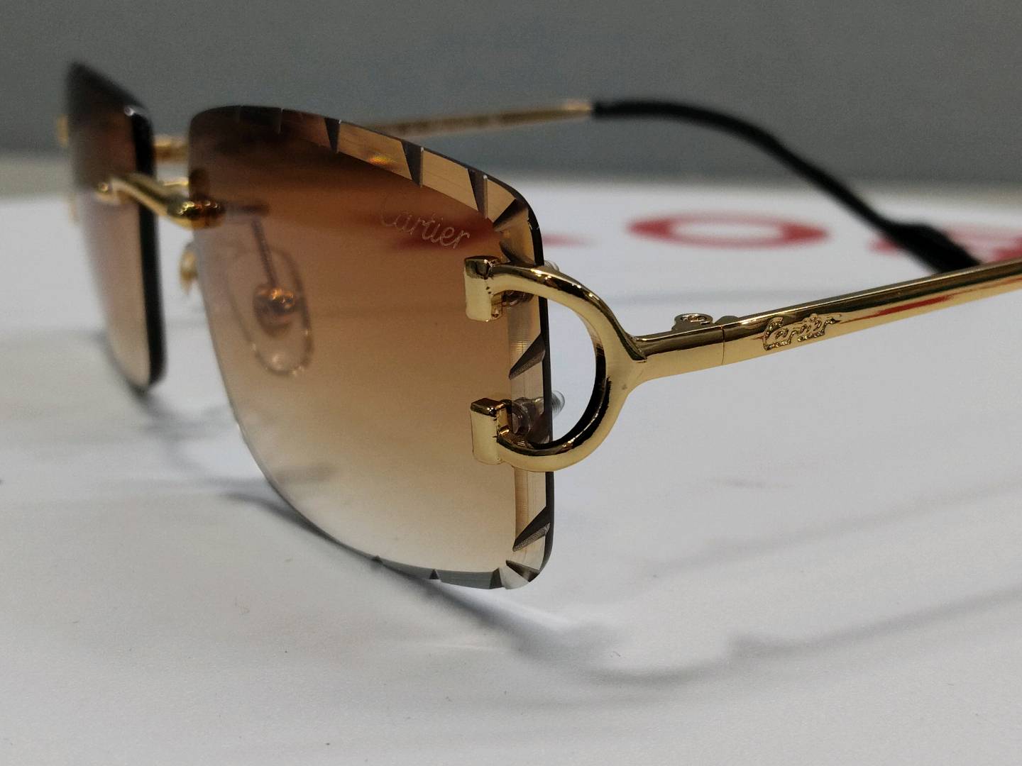 Cartier Diamond-Cut Gradient Rimless Sunglasses QC
