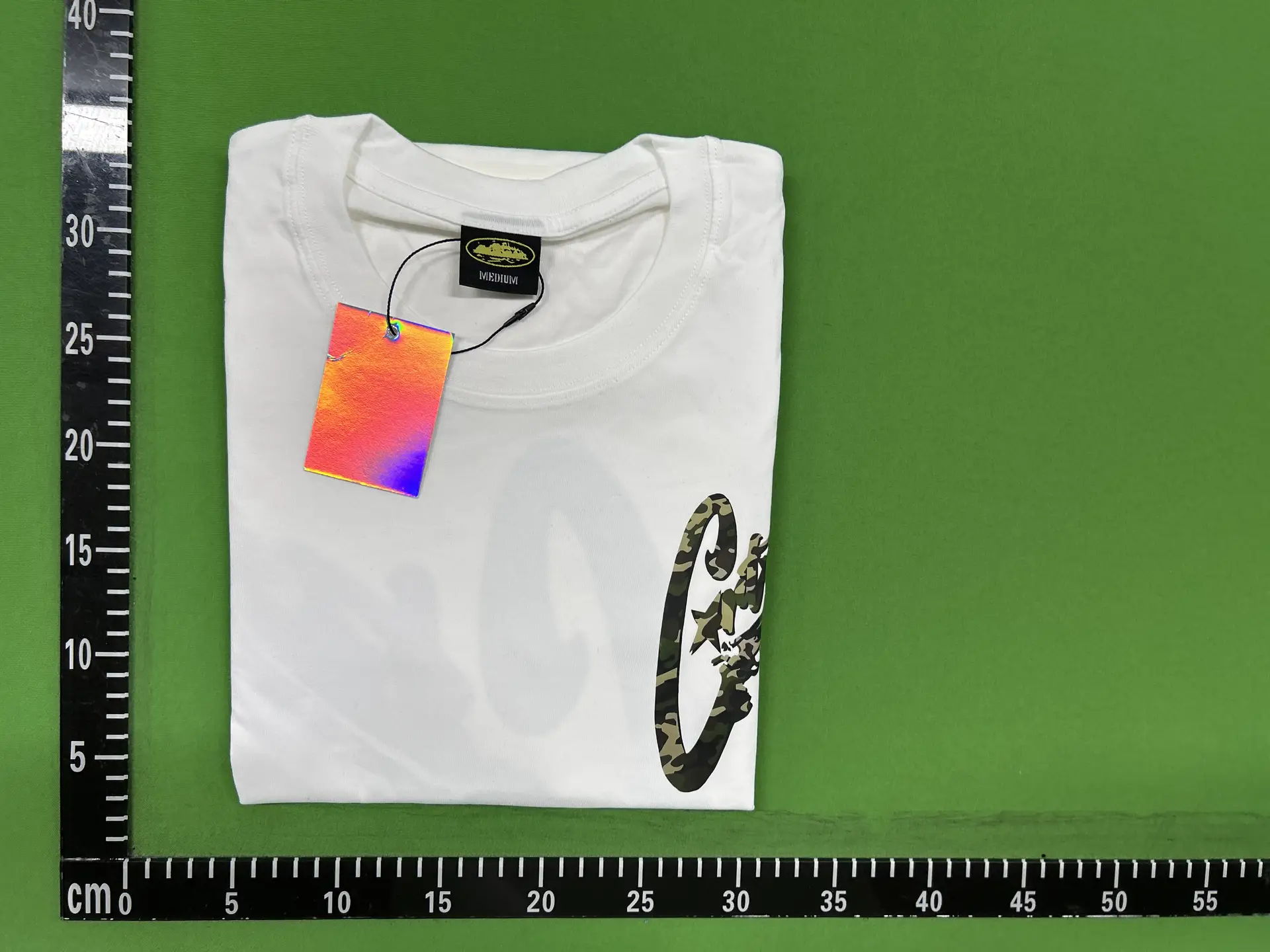 White T-shirt with camouflage graphic