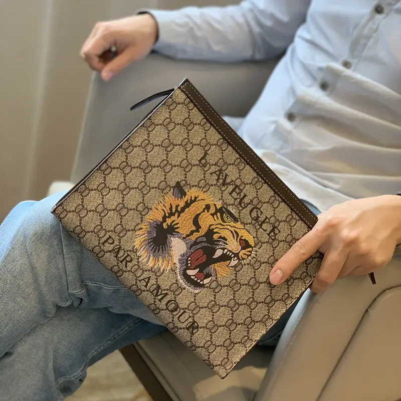 New arrival Big Brand Men Clutch Bag Tiger Head Genuine Leather Clutch Bag Toiletries Bag Internet Celebrity Same Style Handbag Men's Clip Bag Trendy
