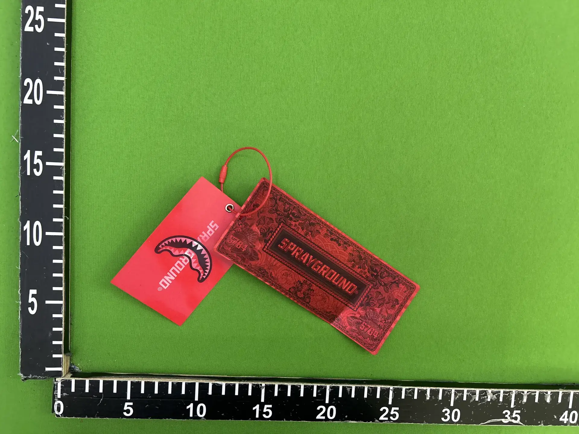 Sprayground Red Shark Tag